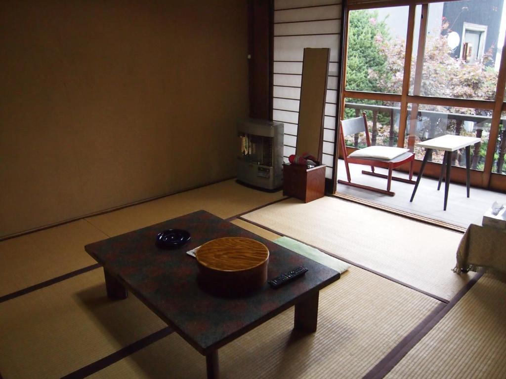 Ishiba Ryokan Хіросакі Номер фото
